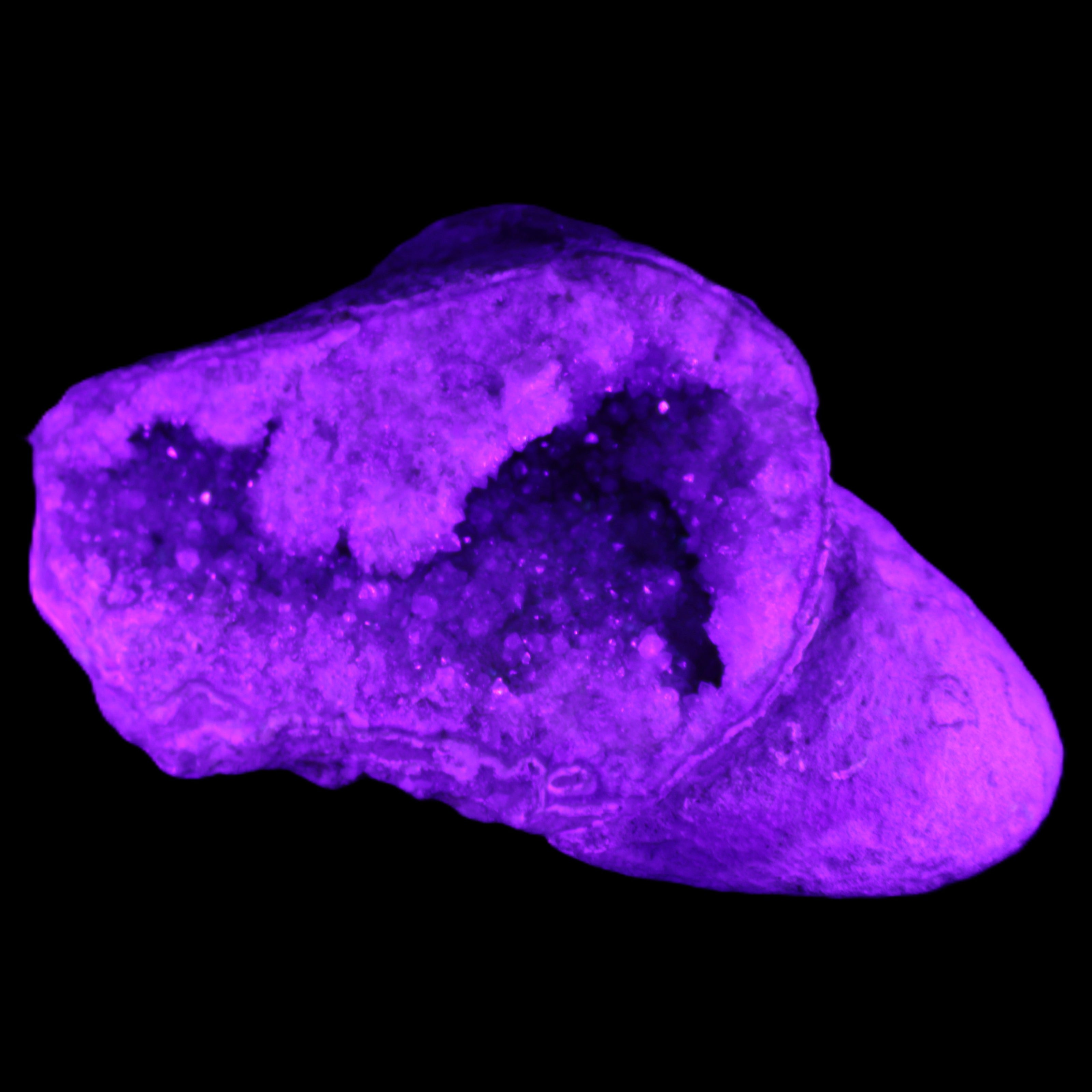 Pink and Violet Amethyst slipper geode 260*190*115mm 3500g in UV light - Rocks and Things Store