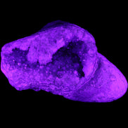 Pink and Violet Amethyst slipper geode 260*190*115mm 3500g in UV light - Rocks and Things Store