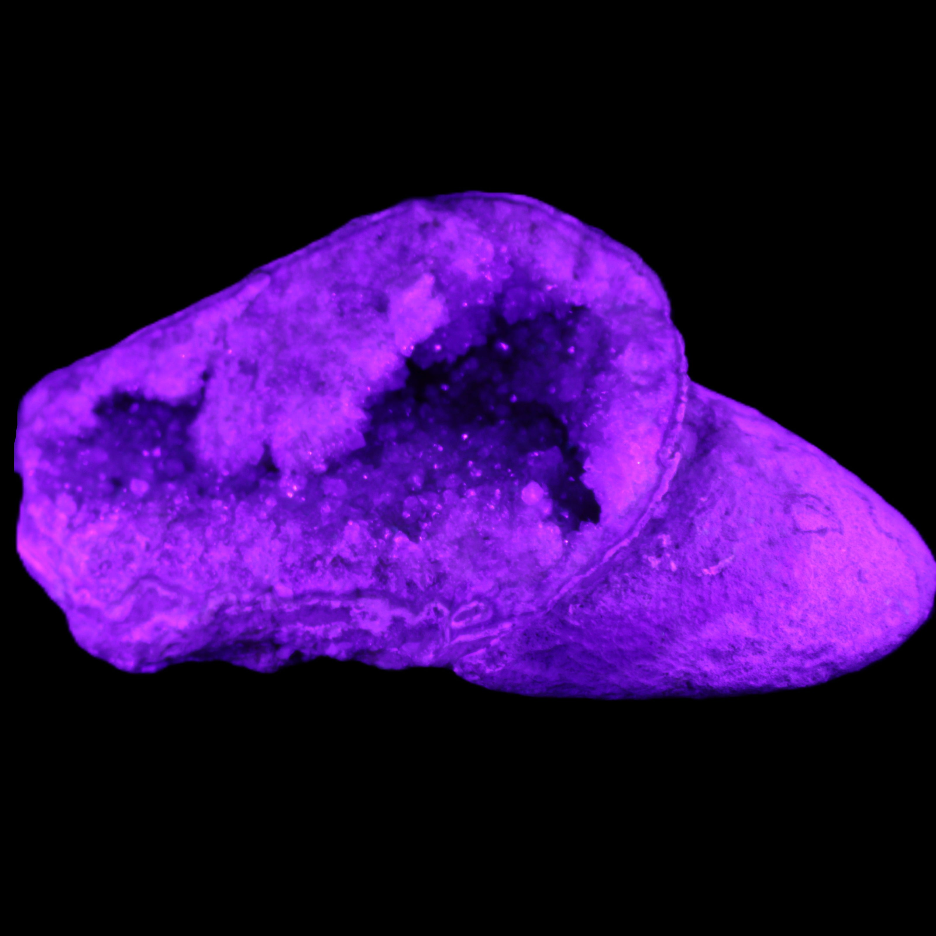 Pink and Violet Amethyst slipper geode 260*190*115mm 3500g in UV light - Rocks and Things Store