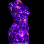 Yooperlite hand carved goddess 40*80mm 156g in UV light - Rocks and Things Store