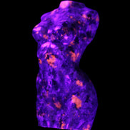 Yooperlite hand carved goddess 40*80mm 156g in UV light - Rocks and Things Store