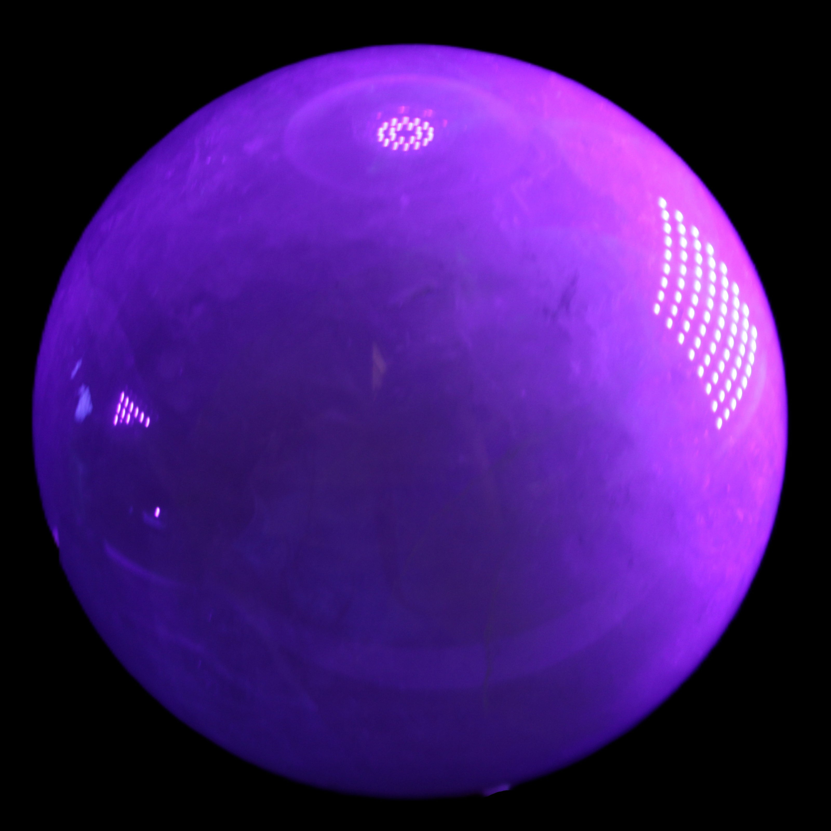 Large Pink Fluorite sphere 150mm 4760g in UV light - Rocks and Things Store