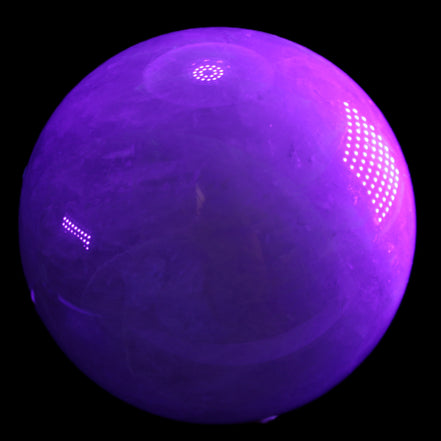 Large Pink Fluorite sphere 150mm 4760g in UV light - Rocks and Things Store