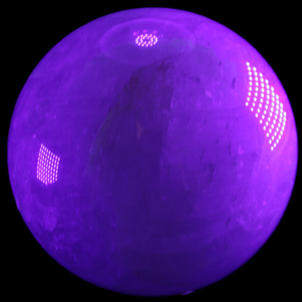 Large Pink Fluorite sphere 150mm 4760g in UV light - Rocks and Things Store