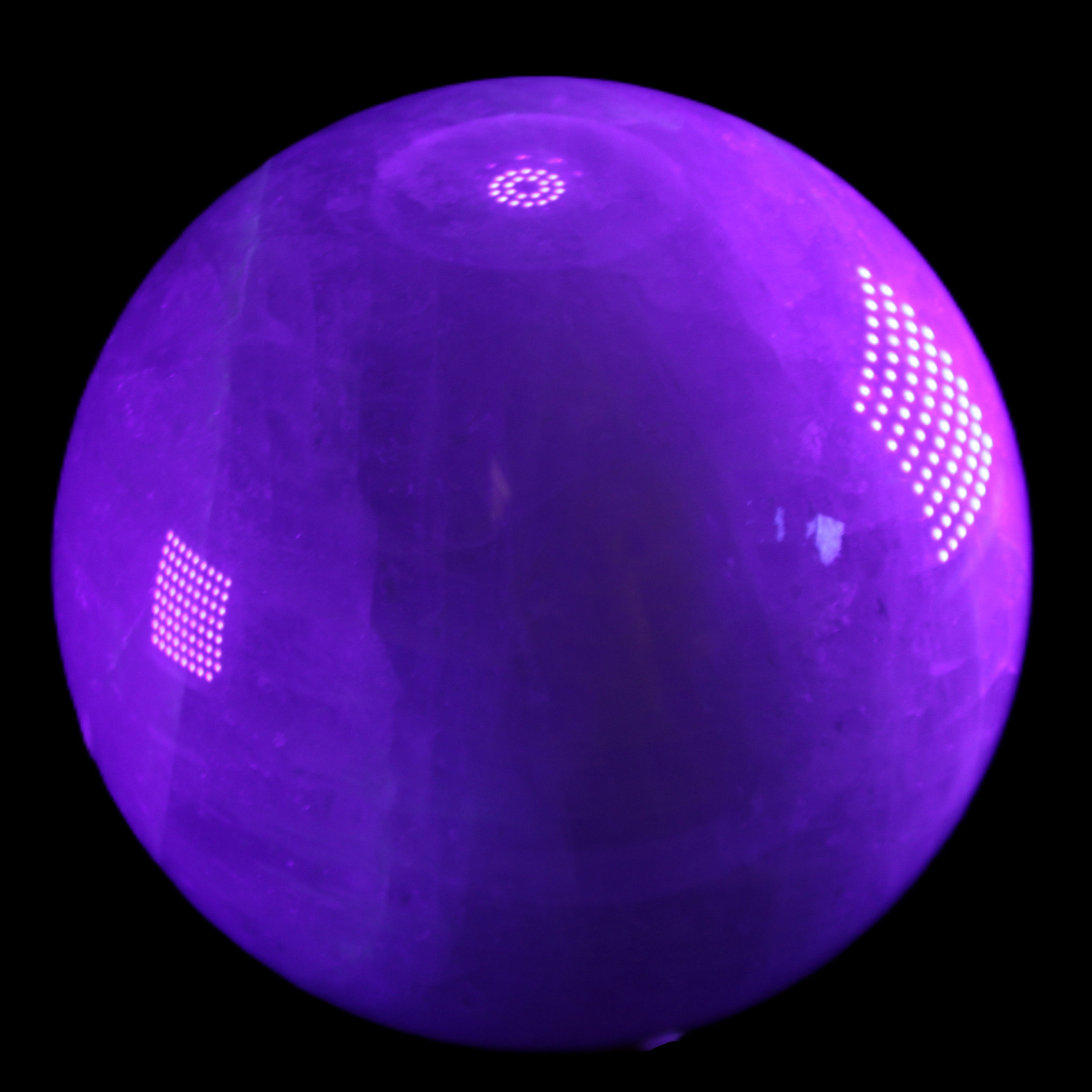 Large Pink Fluorite sphere 150mm 4760g in UV light - Rocks and Things Store