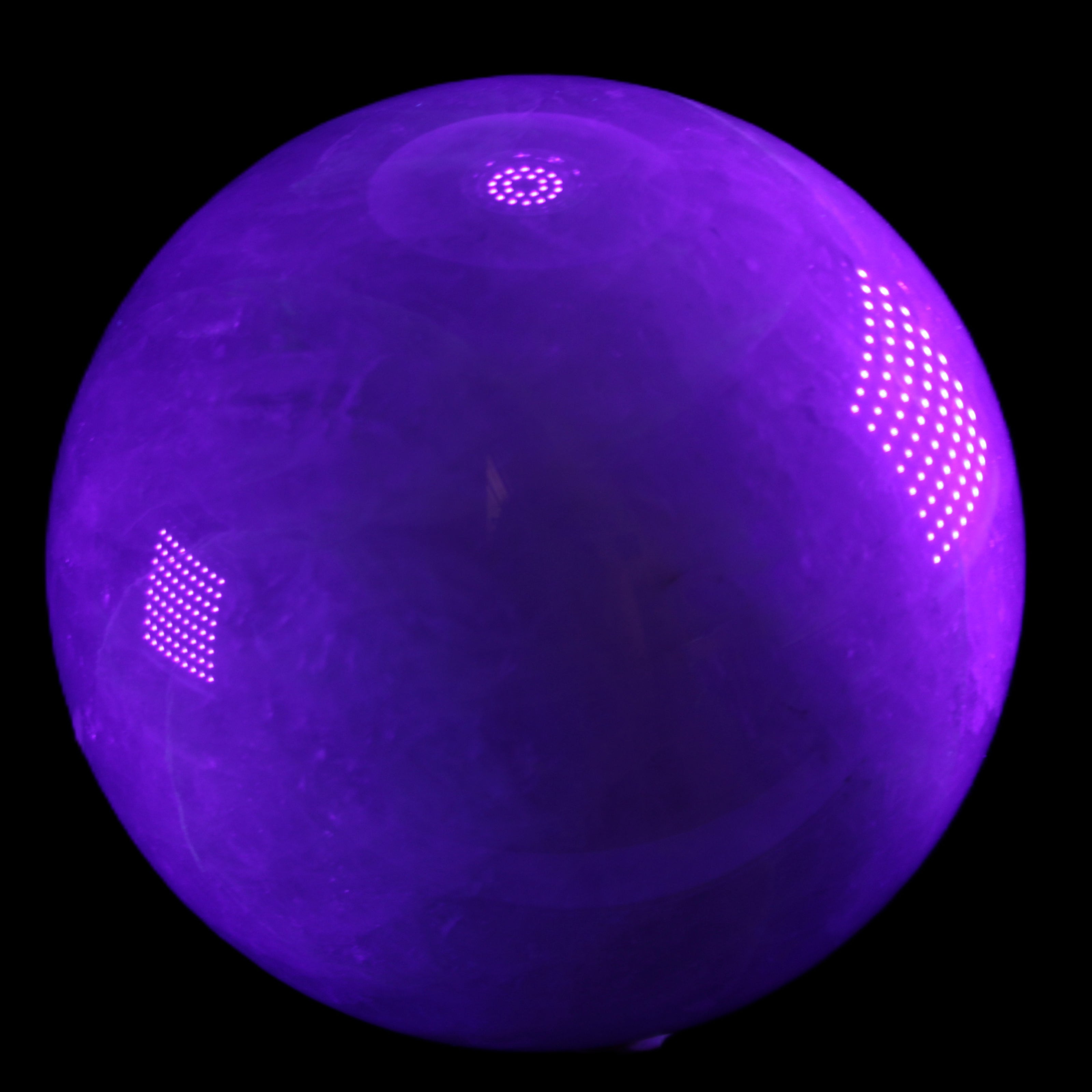 Large Pink Fluorite sphere 150mm 4760g in UV light - Rocks and Things Store