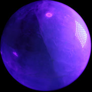 Rainbow Fluorite sphere 130mm 3740g in UV light - Rocks and Things Store