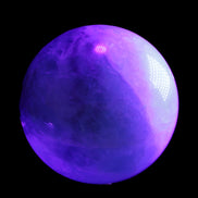 Rainbow Fluorite sphere 130mm 3740g in UV light - Rocks and Things Store