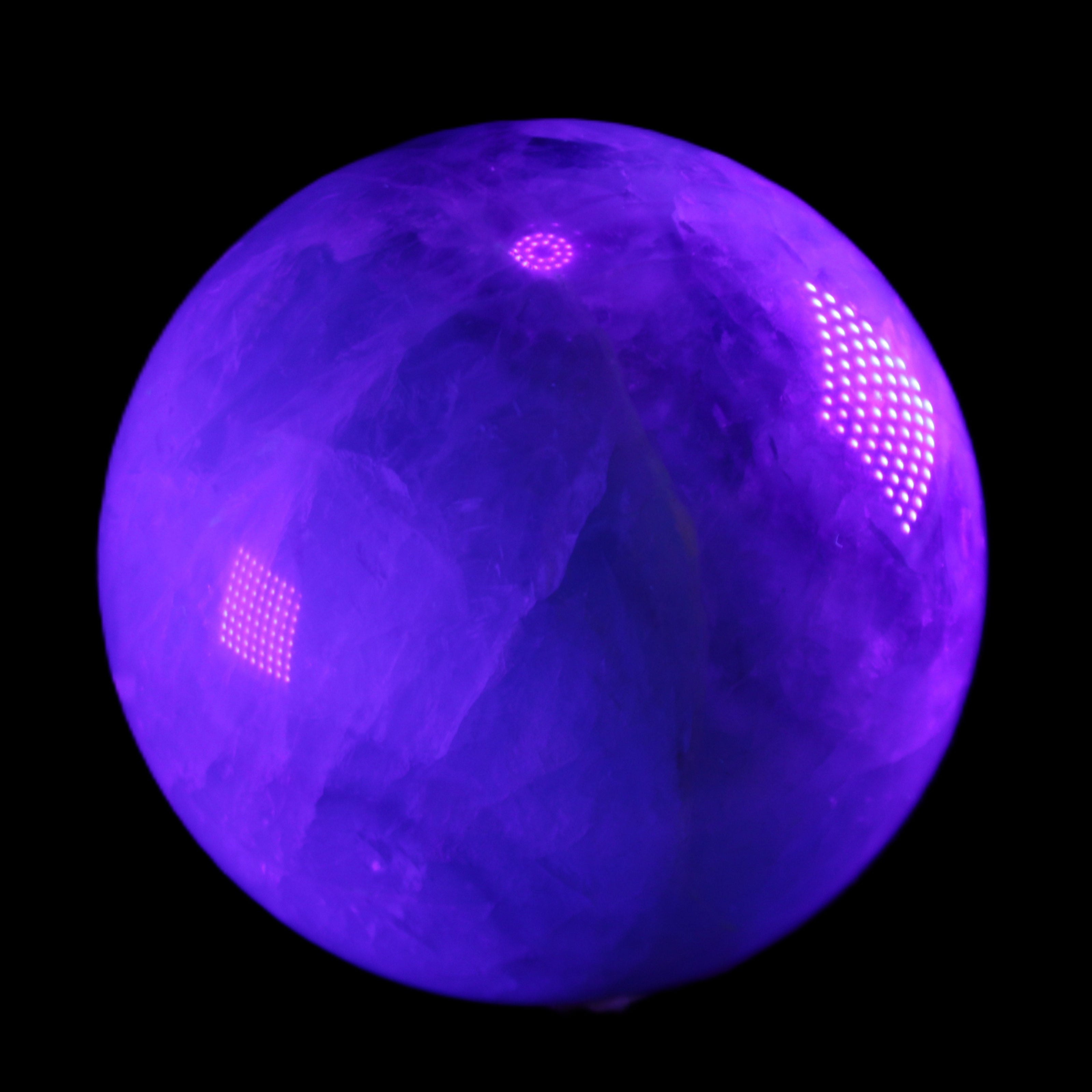 Rainbow Fluorite sphere 130mm 3740g in UV light - Rocks and Things Store