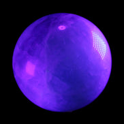 Rainbow Fluorite sphere 130mm 3740g in UV light - Rocks and Things Store