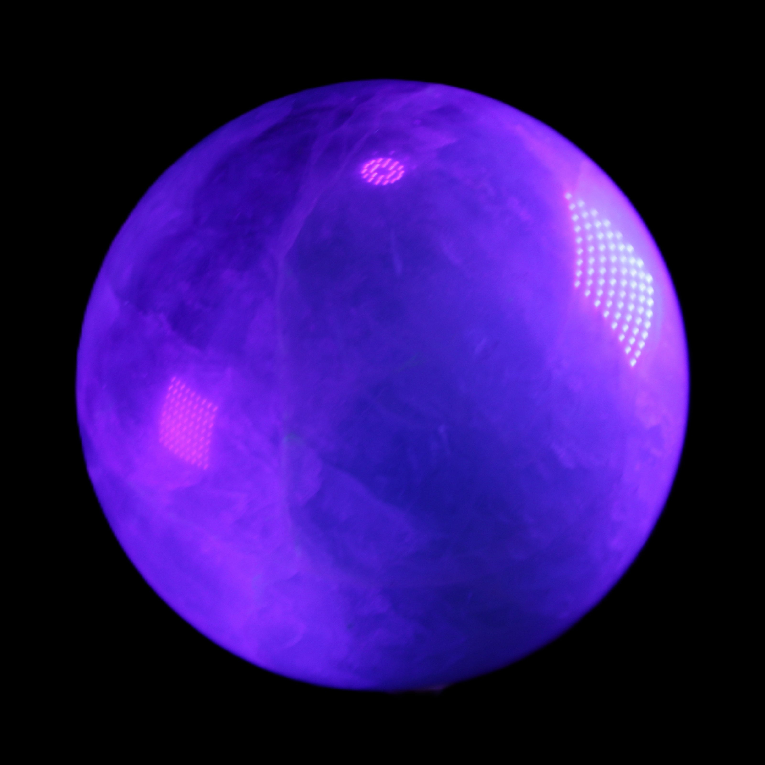 Rainbow Fluorite sphere 130mm 3740g in UV light - Rocks and Things Store