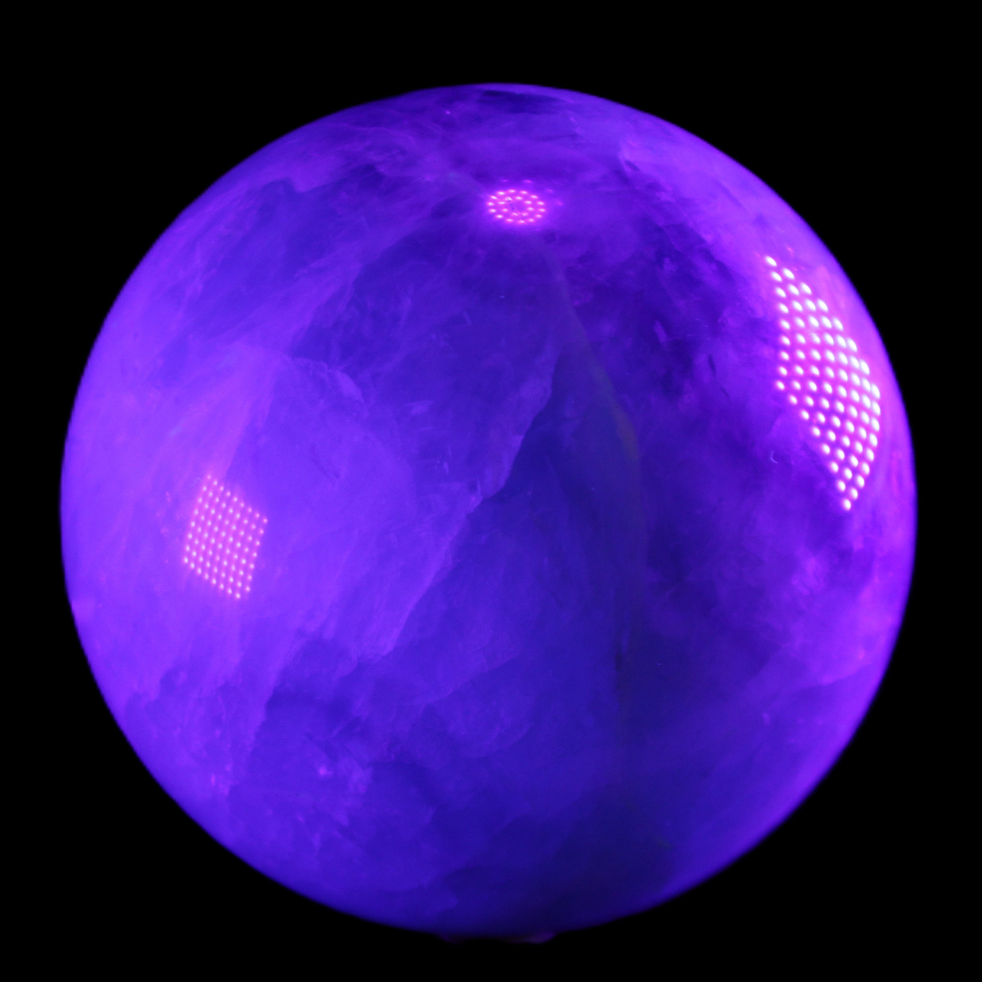 Rainbow Fluorite sphere 130mm 3740g in UV light - Rocks and Things Store