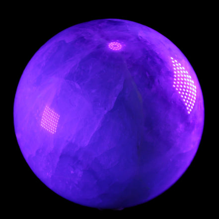 Rainbow Fluorite sphere 130mm 3740g in UV light - Rocks and Things Store