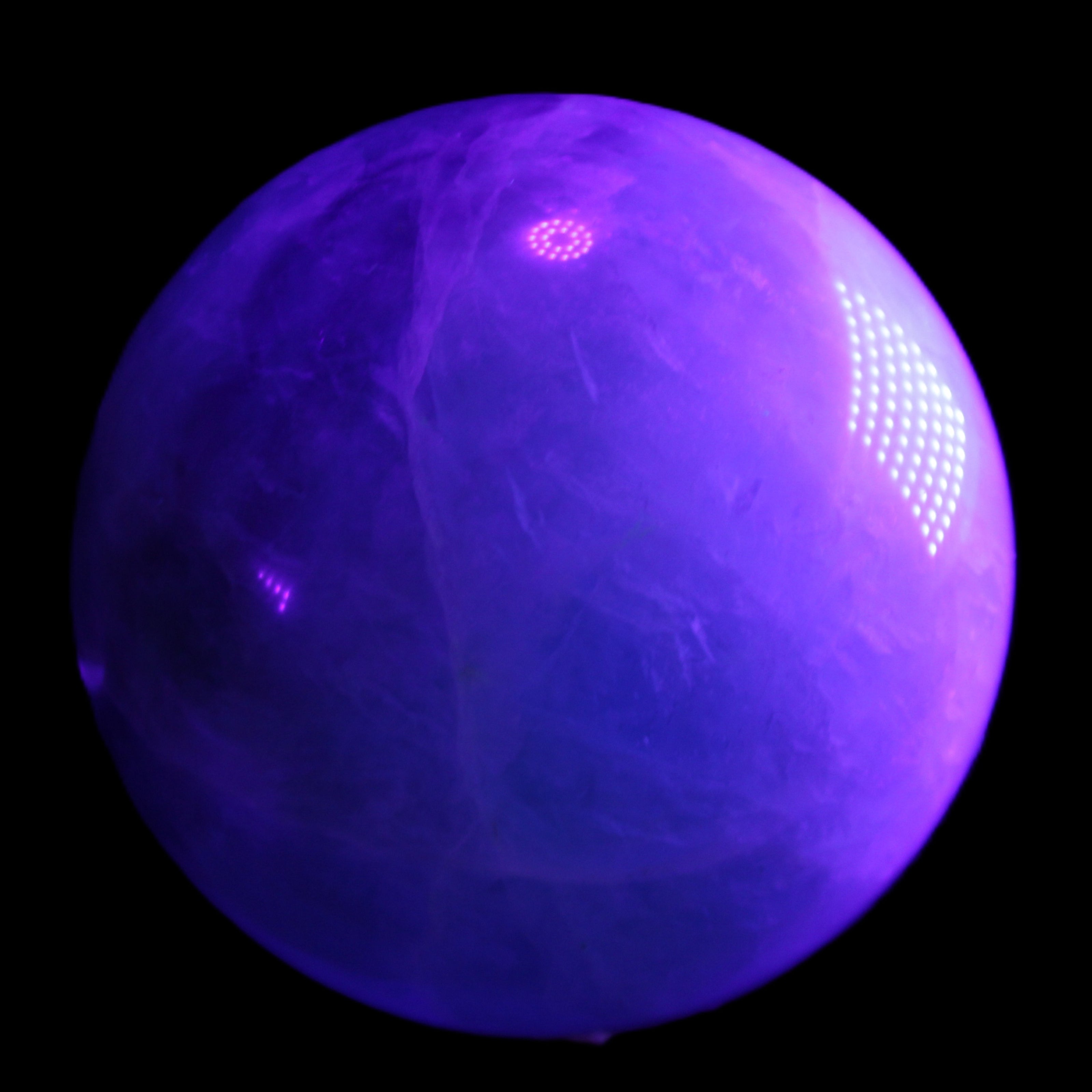 Rainbow Fluorite sphere 130mm 3740g in UV light - Rocks and Things Store