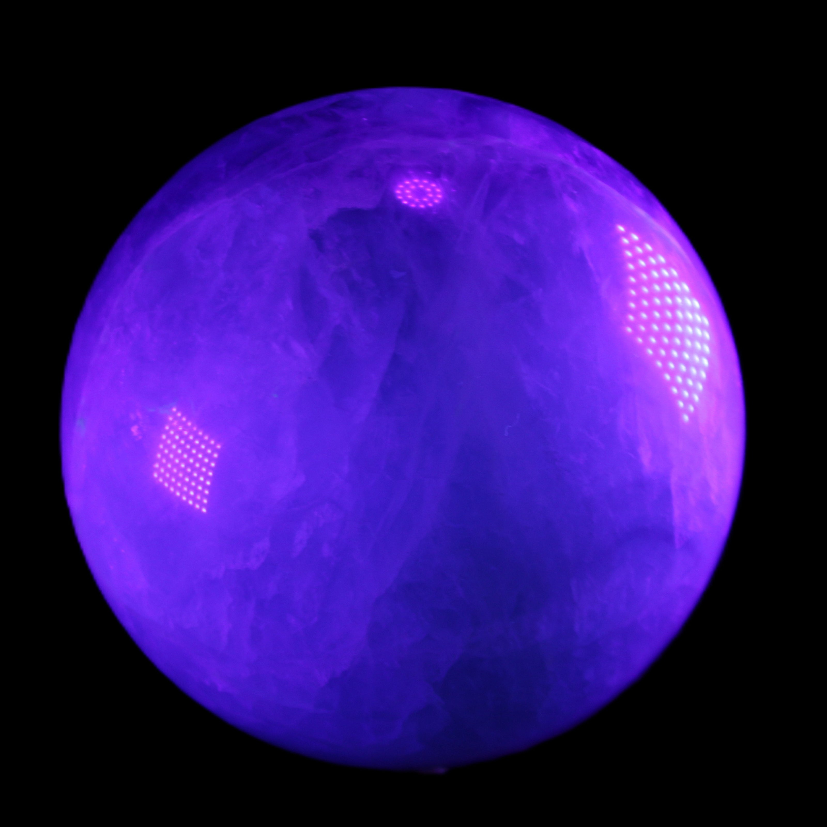 Rainbow Fluorite sphere 130mm 3740g in UV light - Rocks and Things Store