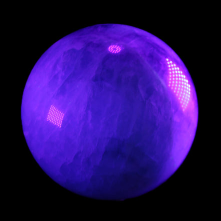 Rainbow Fluorite sphere 130mm 3740g in UV light - Rocks and Things Store