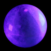 Rainbow Fluorite sphere 130mm 3740g in UV light - Rocks and Things Store