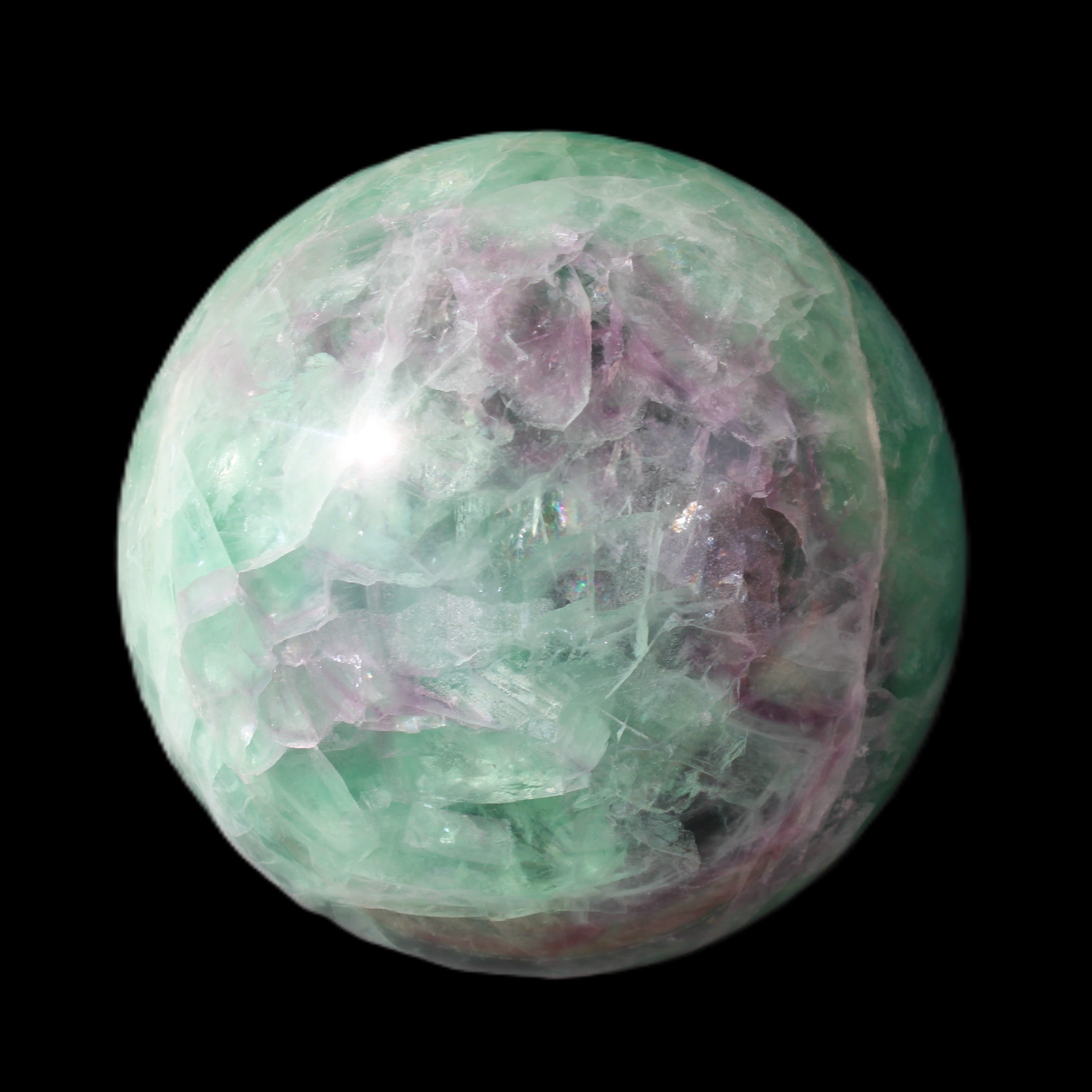 Rainbow Fluorite sphere 130mm 3740g in sunlight - Rocks and Things Store
