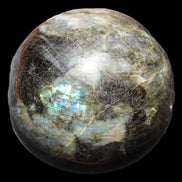 Huge Labradorite sphere 148mm 5320g in sunlight - Rocks and Things Store