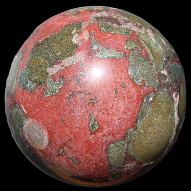 Dragons Blood Stone sphere 146mm 5100g in sunlight - Rocks and Things Store