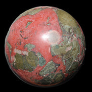 Dragons Blood Stone sphere 146mm 5100g in sunlight - Rocks and Things Store