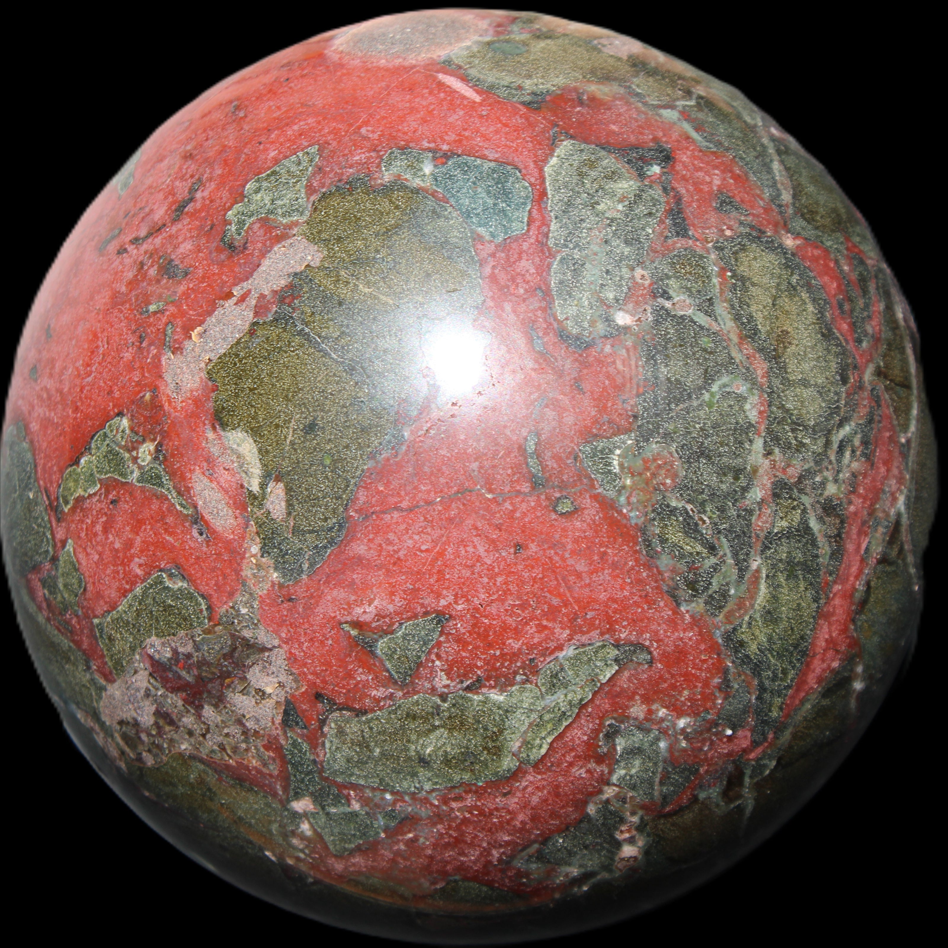 Dragons Blood Stone sphere 146mm 5100g in sunlight - Rocks and Things Store