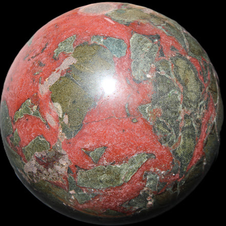 Dragons Blood Stone sphere 146mm 5100g in sunlight - Rocks and Things Store