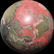 Dragons Blood Stone sphere 146mm 5100g in sunlight - Rocks and Things Store