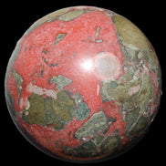 Dragons Blood Stone sphere 146mm 5100g in sunlight - Rocks and Things Store