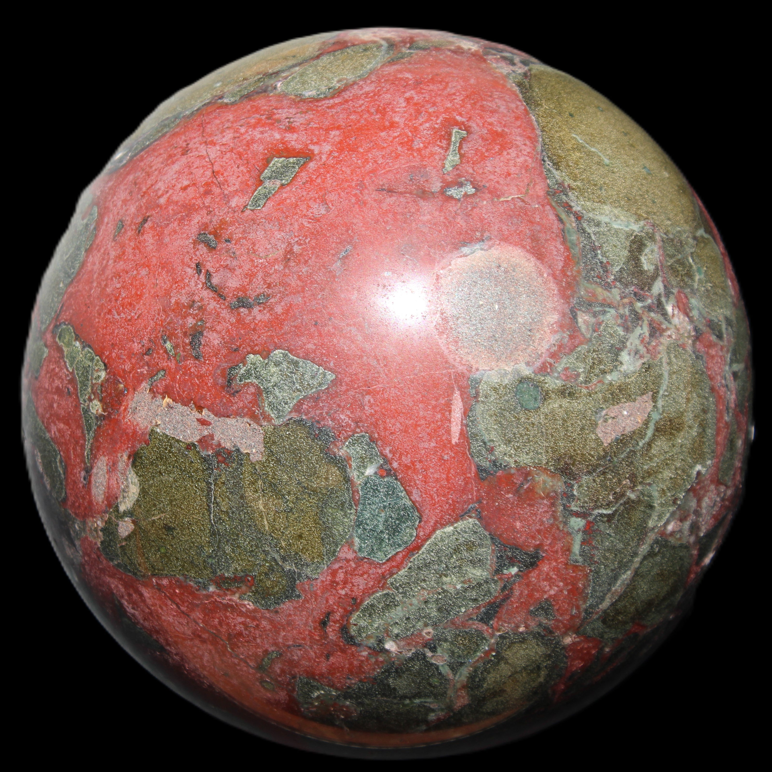 Dragons Blood Stone sphere 146mm 5100g in sunlight - Rocks and Things Store