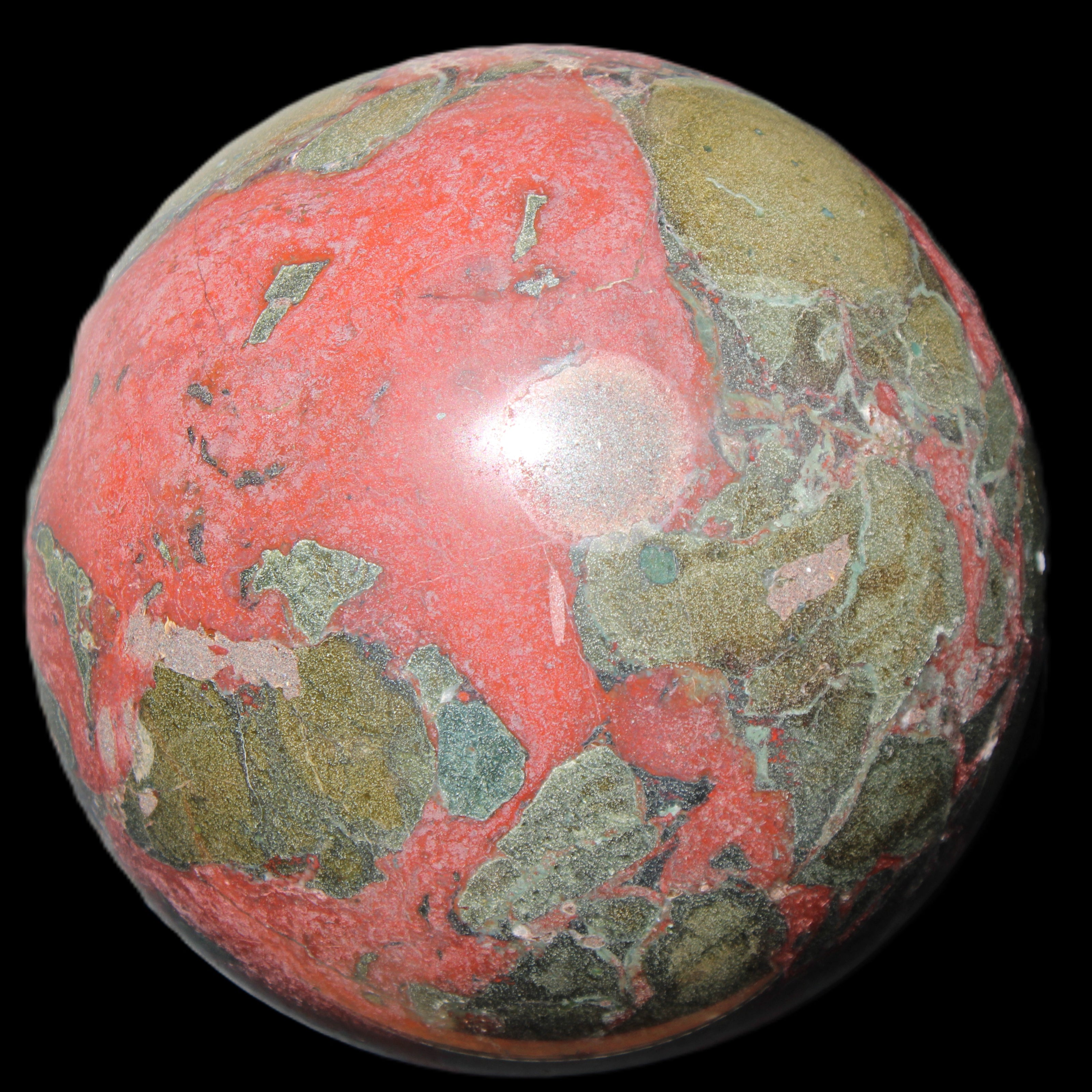 Dragons Blood Stone sphere 146mm 5100g in sunlight - Rocks and Things Store