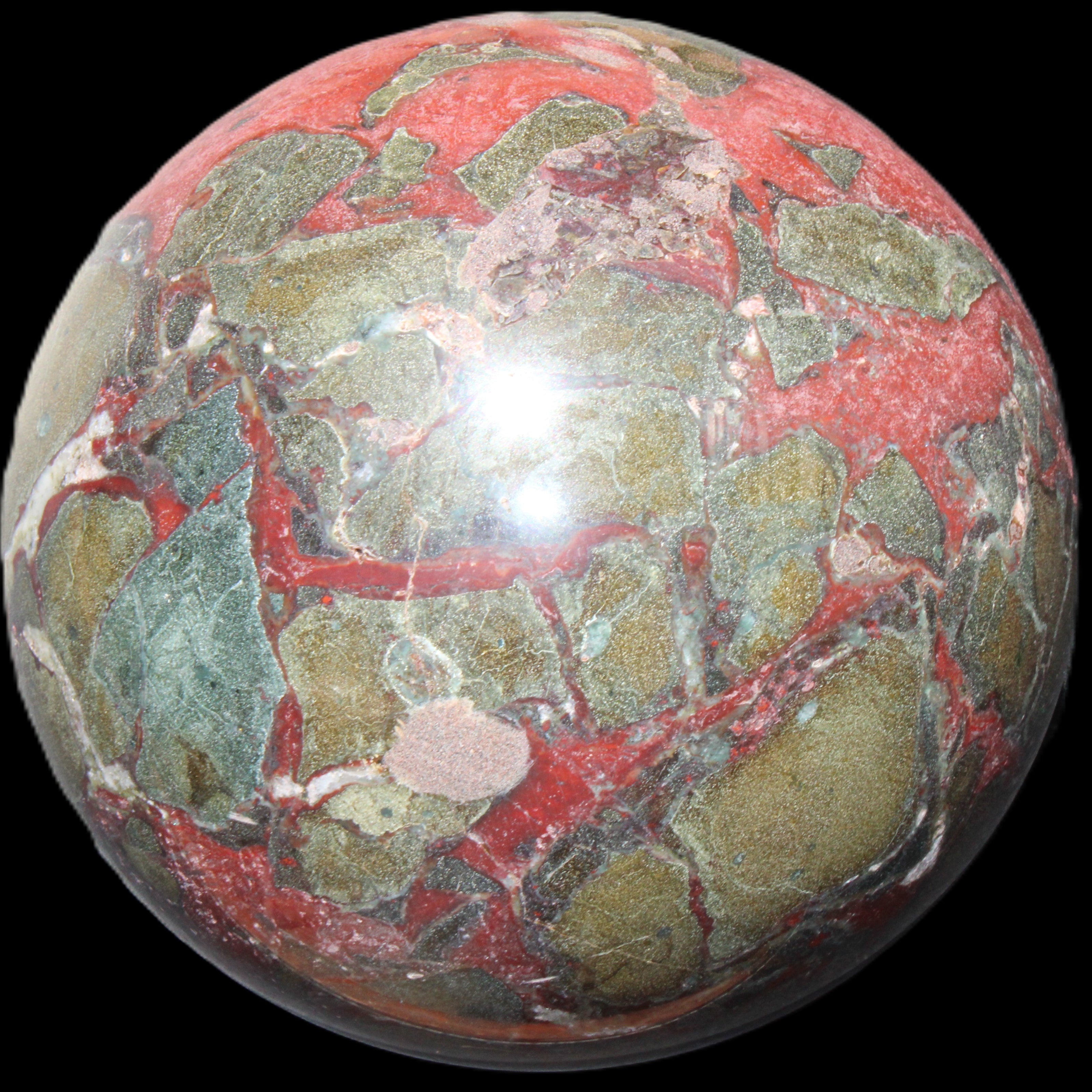 Dragons Blood Stone sphere 146mm 5100g in sunlight - Rocks and Things Store