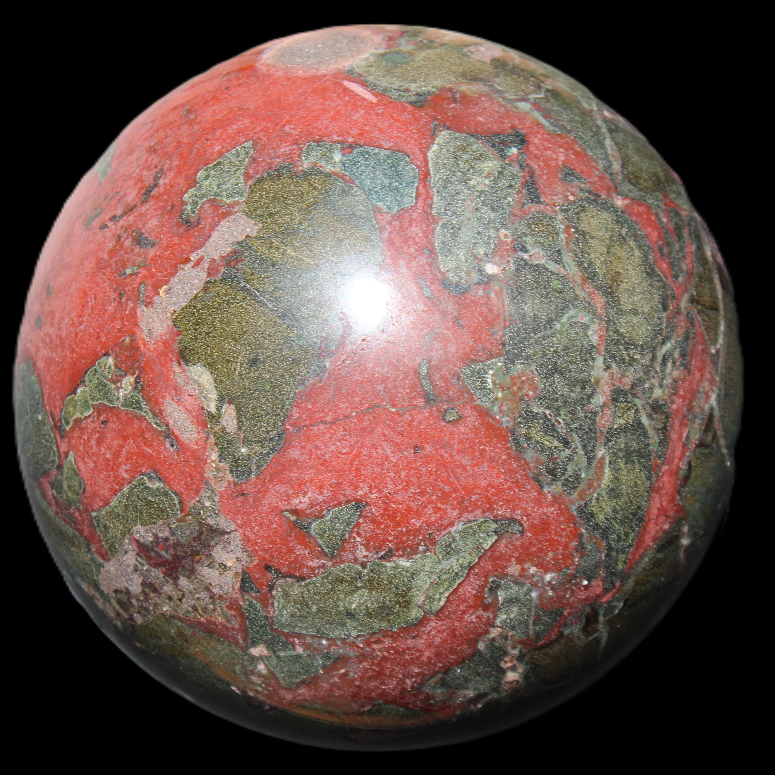 Dragons Blood Stone sphere 146mm 5100g in sunlight - Rocks and Things Store
