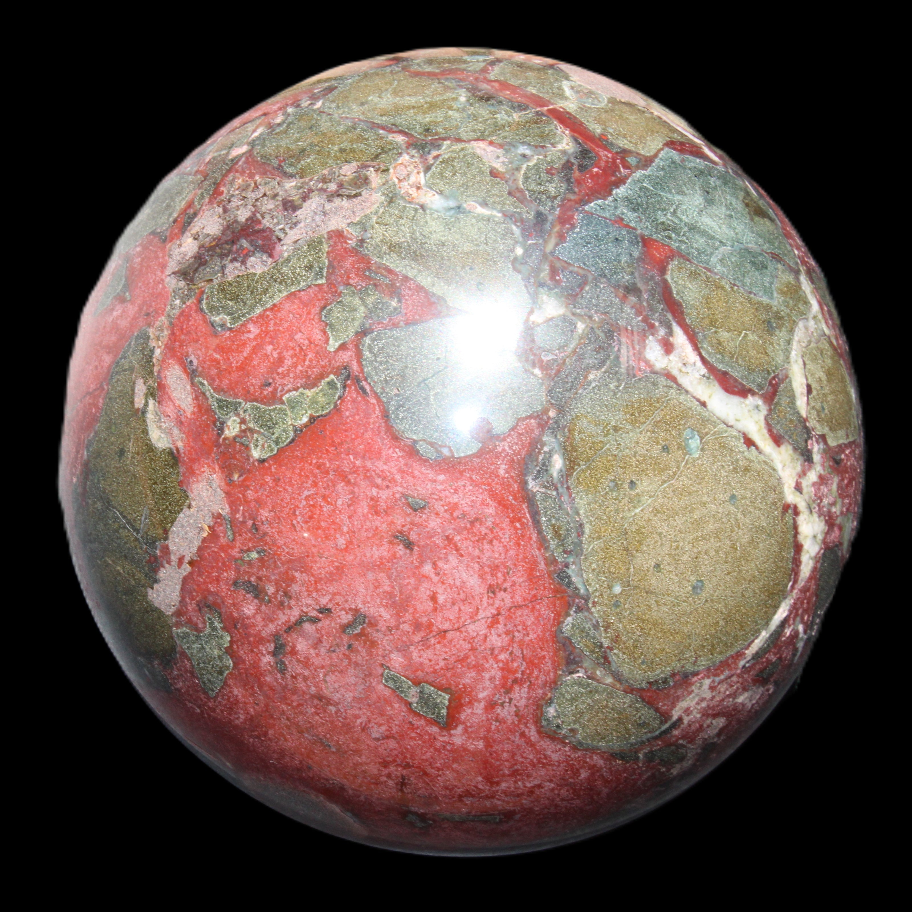 Dragons Blood Stone sphere 146mm 5100g in sunlight - Rocks and Things Store