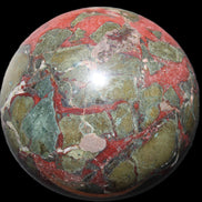 Dragons Blood Stone sphere 146mm 5100g in sunlight - Rocks and Things Store