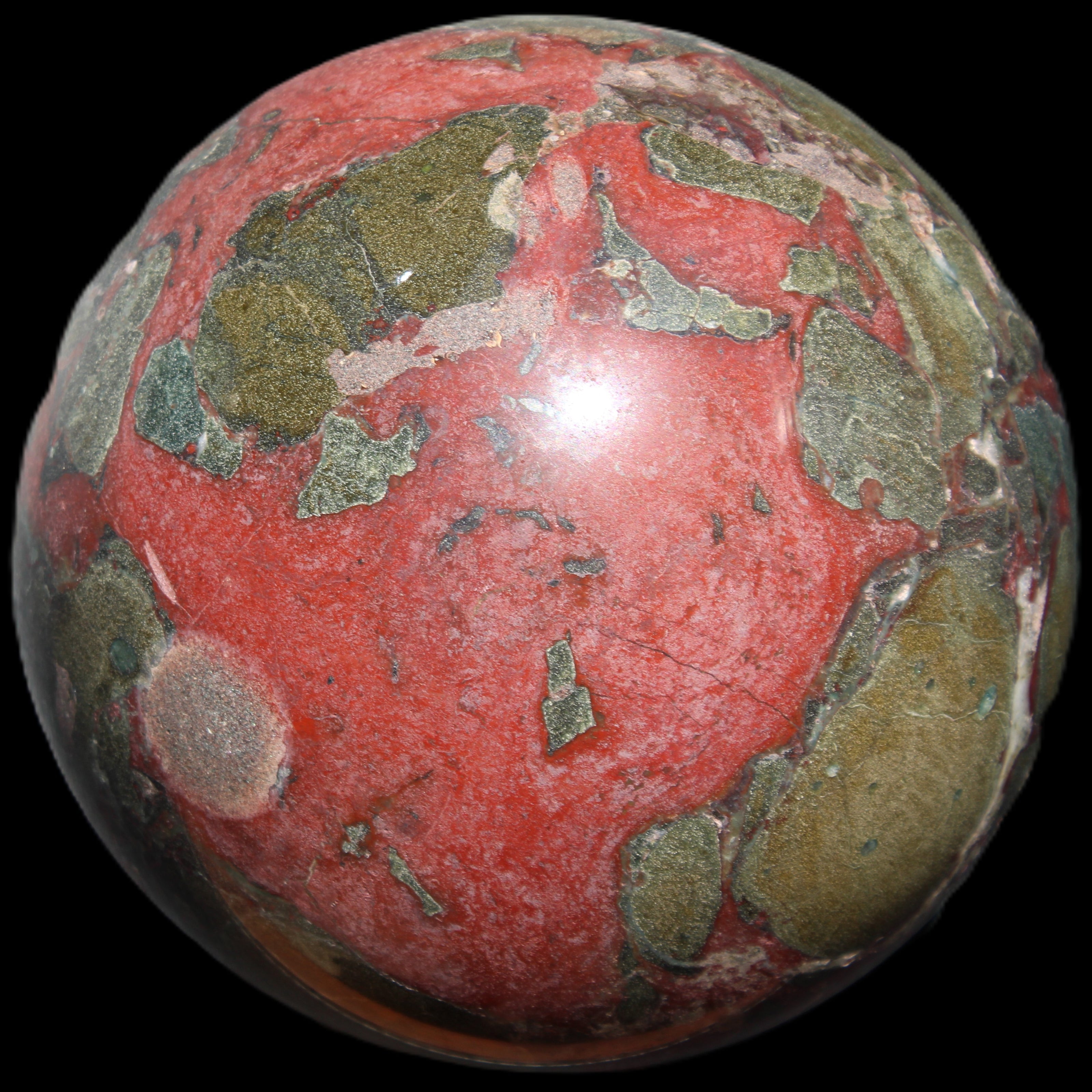 Dragons Blood Stone sphere 146mm 5100g in sunlight - Rocks and Things Store