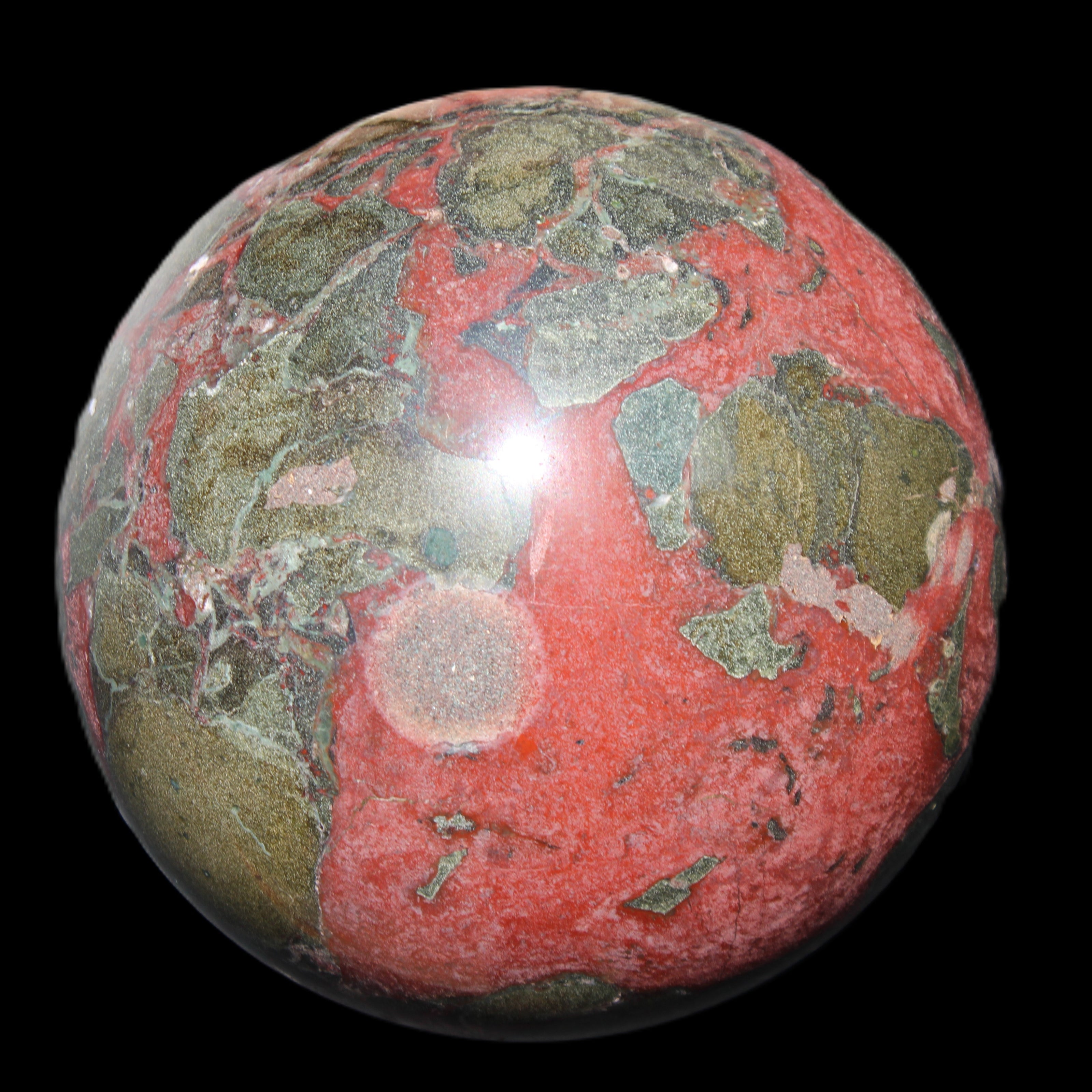 Dragons Blood Stone sphere 146mm 5100g in sunlight - Rocks and Things Store