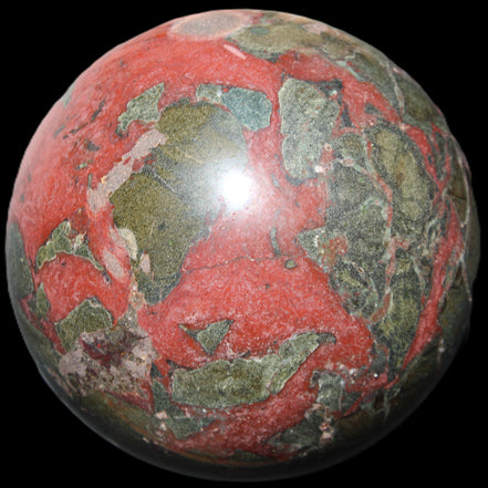 Dragons Blood Stone sphere 146mm 5100g in sunlight - Rocks and Things Store