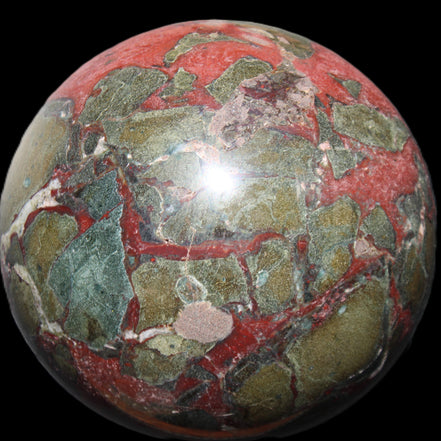 Dragons Blood Stone sphere 146mm 5100g in sunlight - Rocks and Things Store