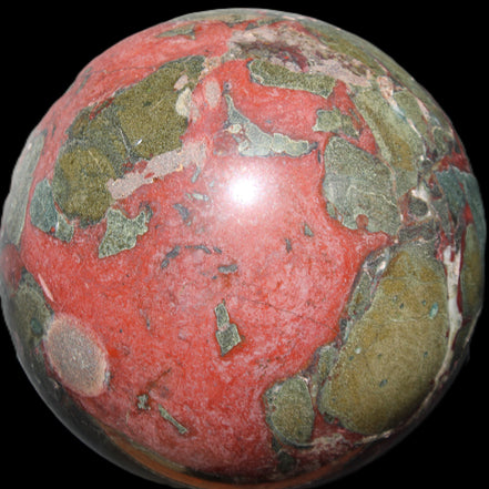 Dragons Blood Stone sphere 146mm 5100g in sunlight - Rocks and Things Store