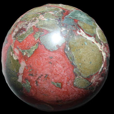 Dragons Blood Stone sphere 146mm 5100g in sunlight - Rocks and Things Store