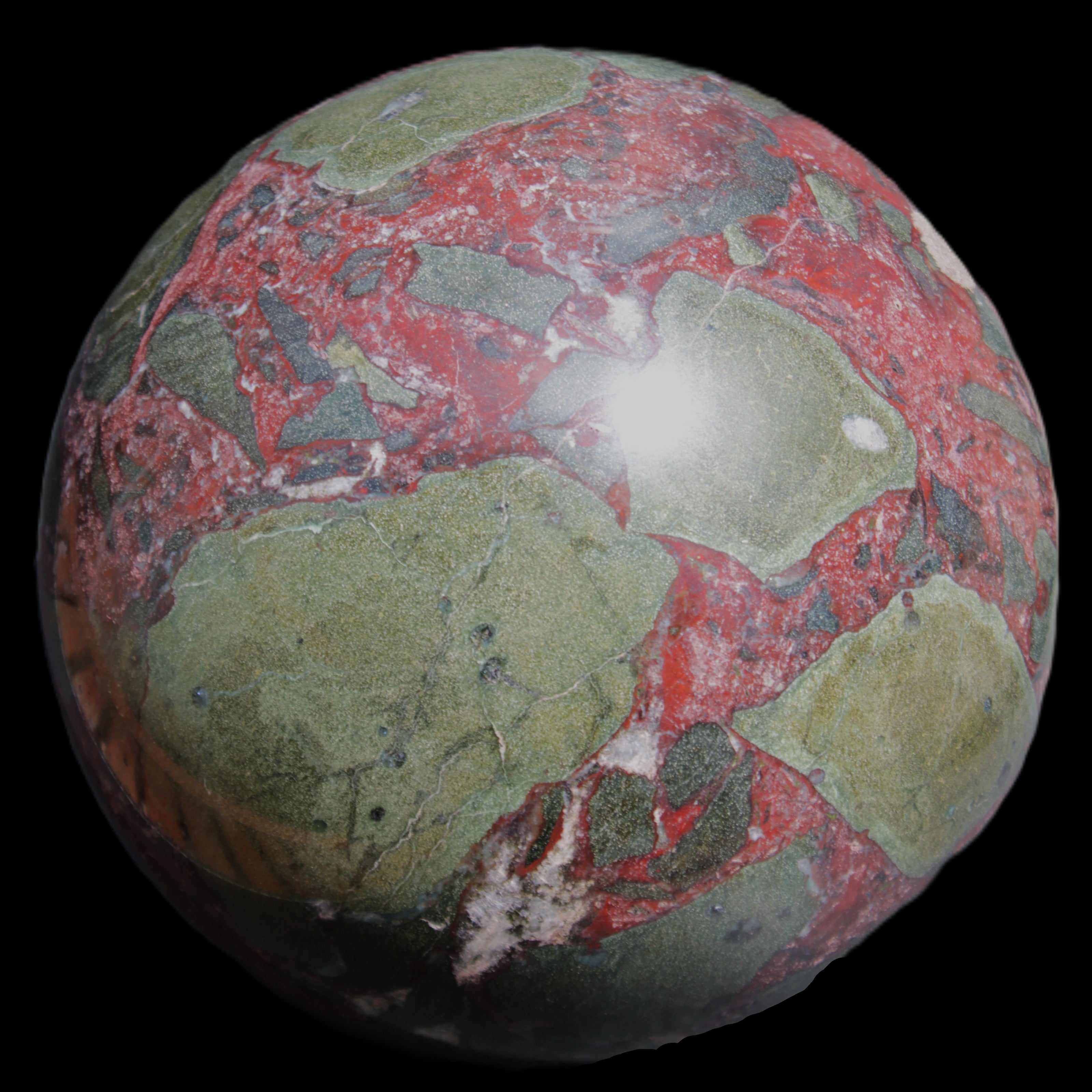 Dragons Blood Stone sphere 143mm 4620g in sunlight - Rocks and Things Store