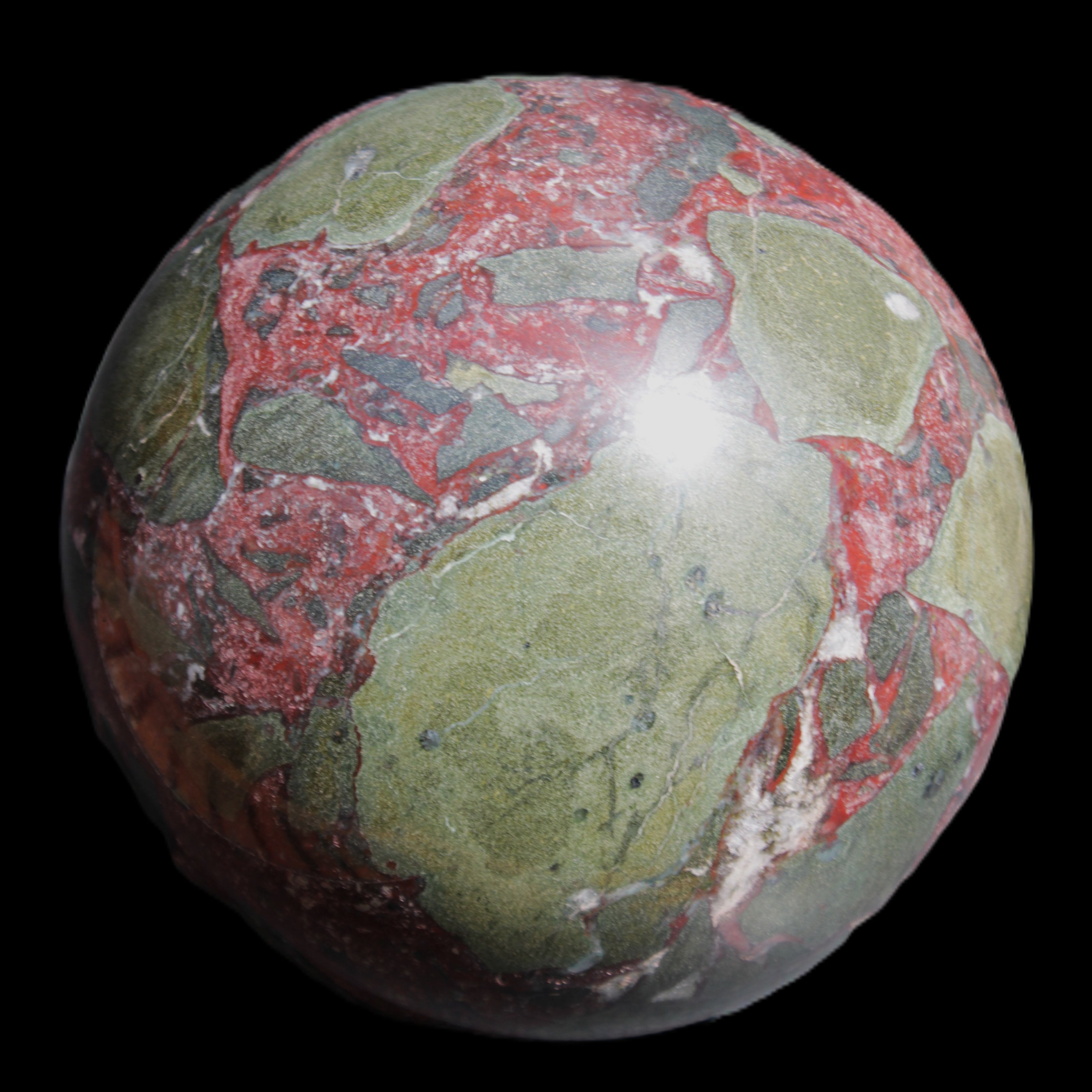 Dragons Blood Stone sphere 143mm 4620g in sunlight - Rocks and Things Store