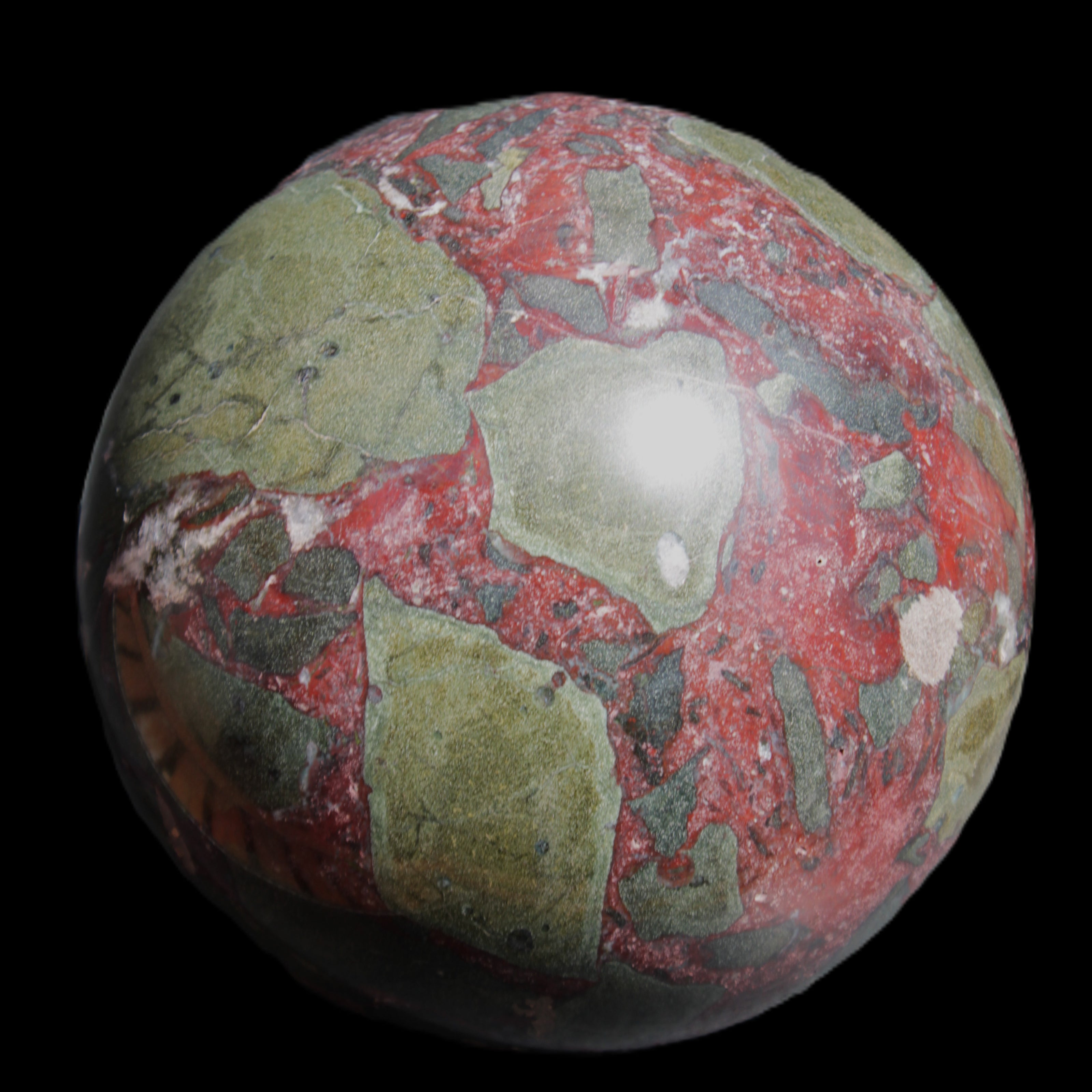 Dragons Blood Stone sphere 143mm 4620g in sunlight - Rocks and Things Store