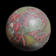 Dragons Blood Stone sphere 143mm 4620g in sunlight - Rocks and Things Store