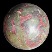 Dragons Blood Stone sphere 143mm 4620g in sunlight - Rocks and Things Store