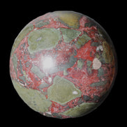 Dragons Blood Stone sphere 143mm 4620g in sunlight - Rocks and Things Store