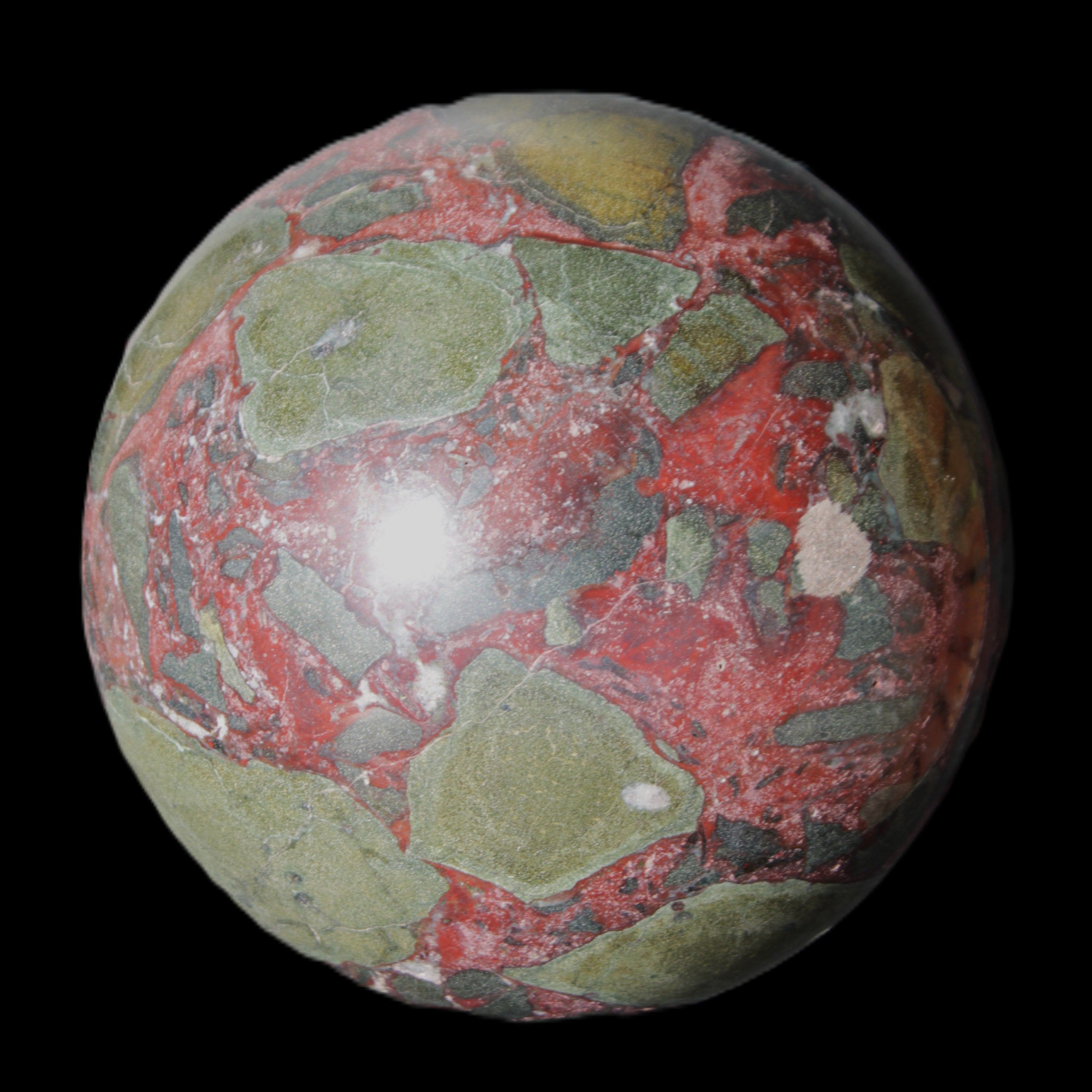 Dragons Blood Stone sphere 143mm 4620g in sunlight - Rocks and Things Store