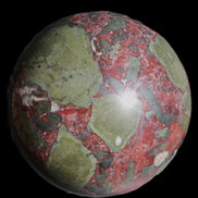 Dragons Blood Stone sphere 143mm 4620g in sunlight - Rocks and Things Store