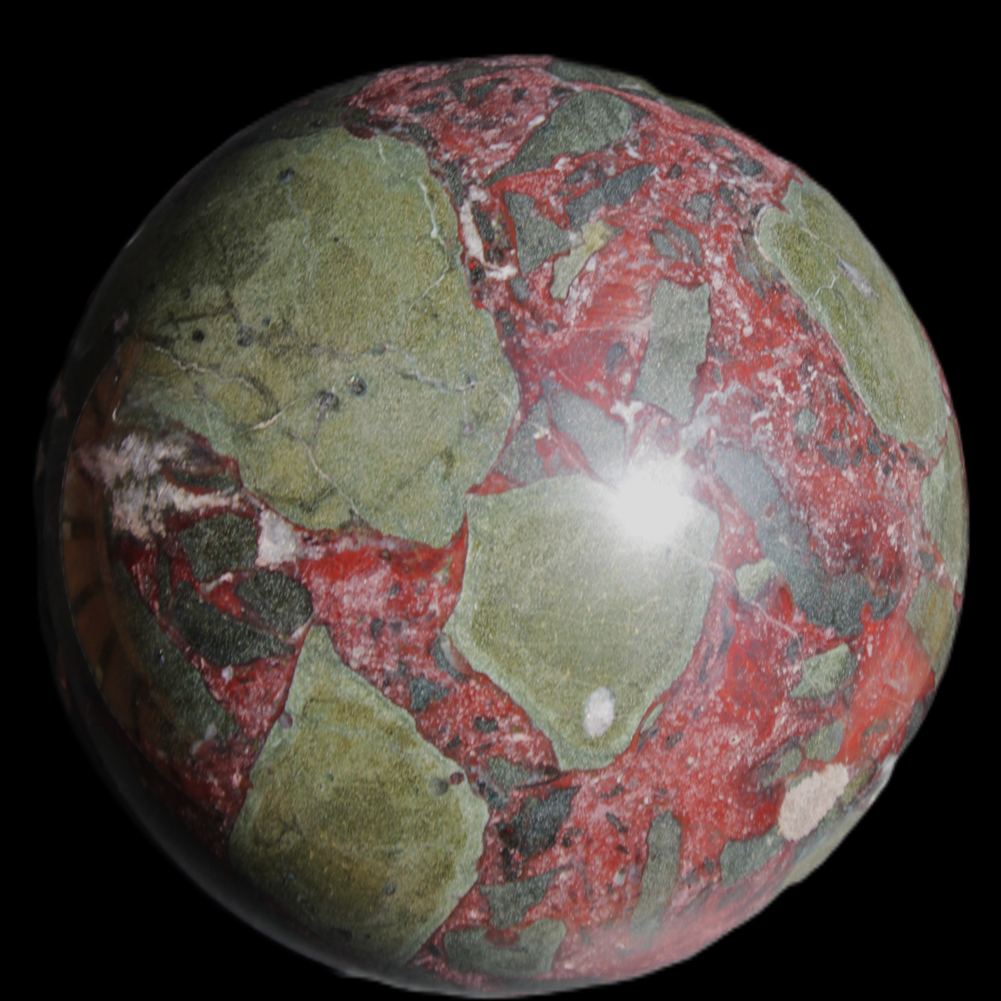 Dragons Blood Stone sphere 143mm 4620g in sunlight - Rocks and Things Store